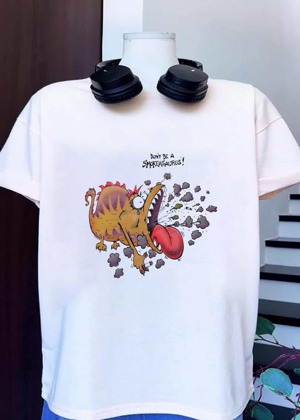 Buttoutz Don’t Be a Smokeasaurus Smoking Dinosaur Cartoon T-Shirt