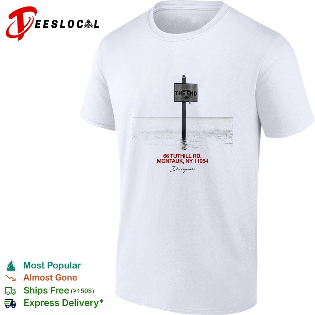 Duryea’s the end sign standing alone in Montauk ocean water black and white shirt