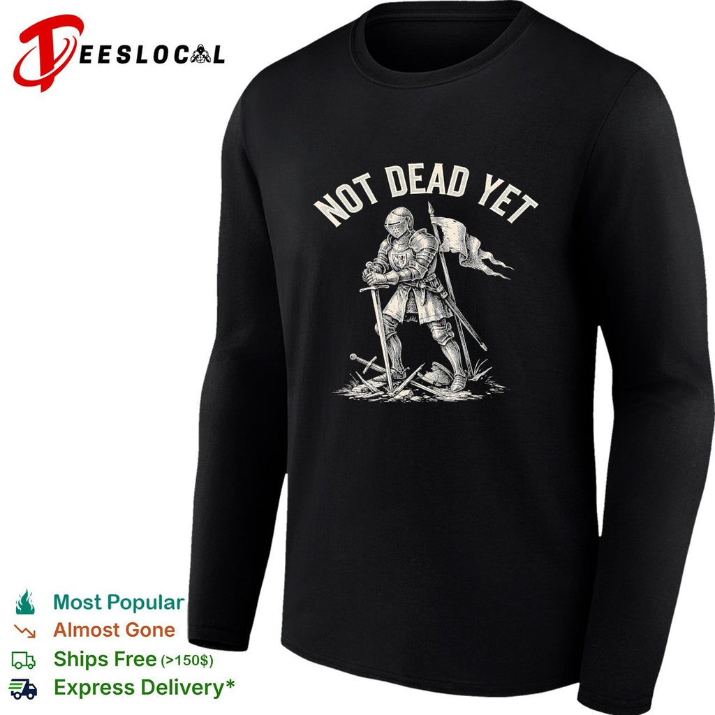 Not dead yet knight standing triumphant among broken swords holding banner flag shirt