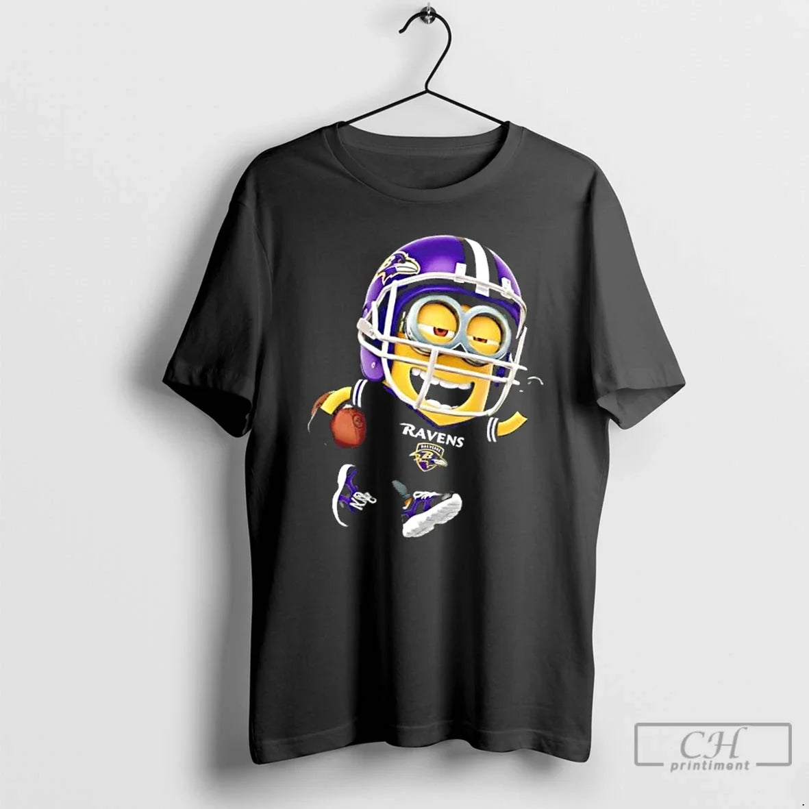 Premium Minions Is Holding A Ball And Smiling At Baltimore Ravens T Shirts Unisex , , , Long Sleeve Tee