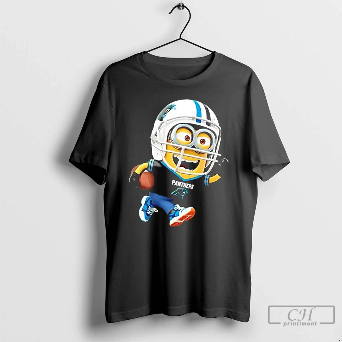 Premium Minions Is Holding A Ball And Smiling At Carolina Panthers T Shirts Unisex , , , Long Sleeve Tee