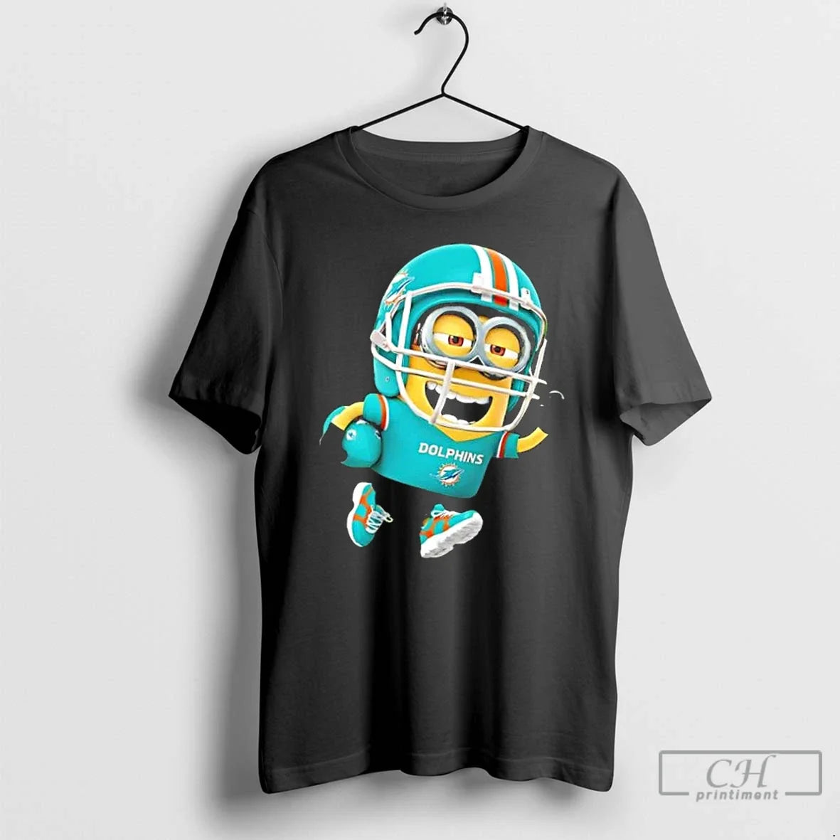 Premium Minions Is Holding A Ball And Smiling At Miami Dolphins Fans T Shirts Unisex , , , Long Sleeve Tee