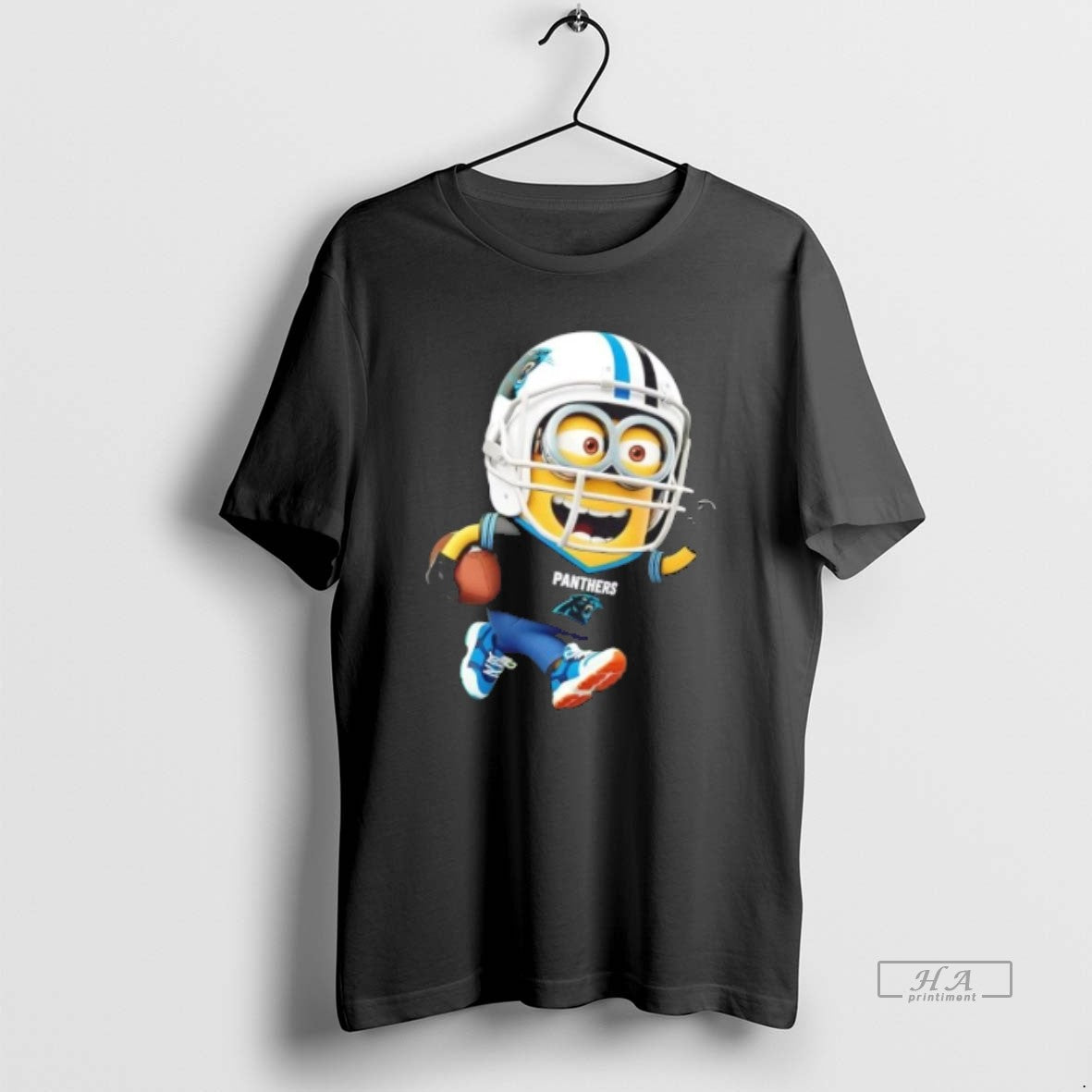Trendy Minions Is Holding A Ball And Smiling At Carolina Panthers Unisex , , , Long Sleeve Tee