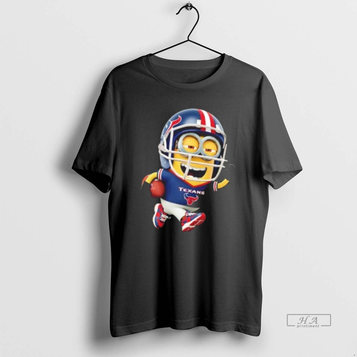 Trendy Minions Is Holding A Ball And Smiling At Houston Texans Fans Unisex , , , Long Sleeve Tee